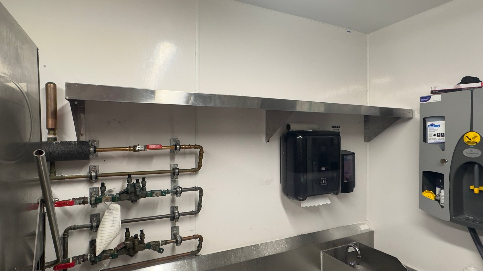 Custom cut to fit stainless shelf-